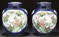 19th century A pair of famille verte powder blue ground ginger jars and covers